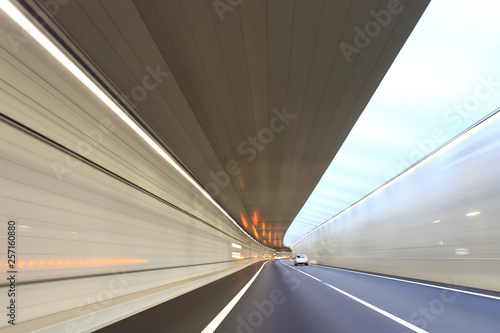 Car driving through the tunnel