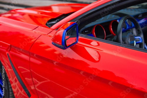 The image Red car side mirror © Igor Syrbu