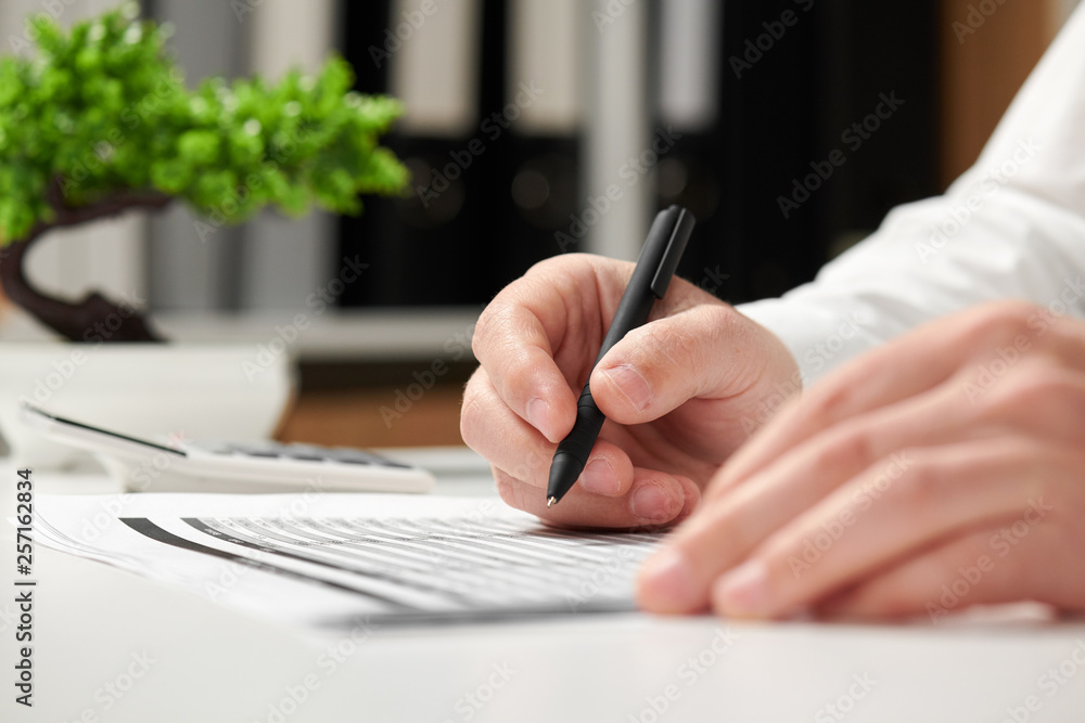 Businessman working in office and calculating finance. Business financial accounting concept. Businessman working in office and calculating finance. Business financial accounting concept.
