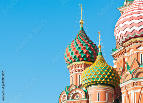 Domes of the Cathedral of Vasily the Blessed (Saint Basil's Cathedral) on Red square in sunny day.  Close up. Moscow. Russia