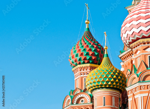 Domes of the Cathedral of Vasily the Blessed (Saint Basil's Cathedral) on Red square in sunny day.  Close up. Moscow. Russia