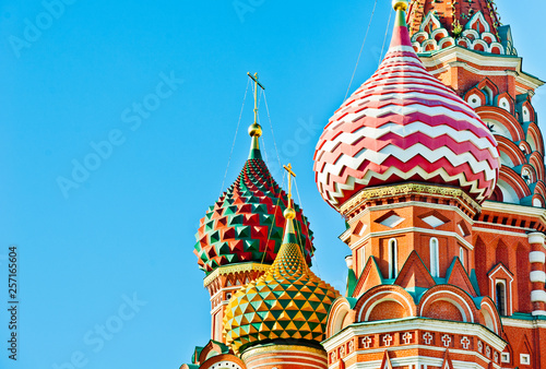 Domes of the Cathedral of Vasily the Blessed (Saint Basil's Cathedral) on Red square in sunny day.  Close up. Moscow. Russia