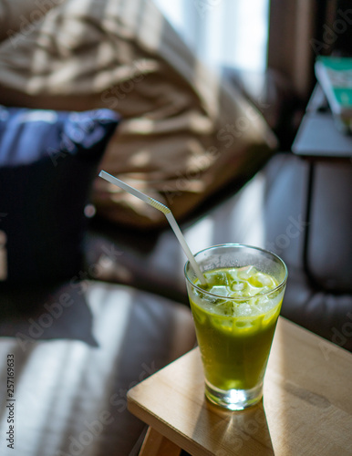 Cold Drink - Iced Milk Green Tea in a Clear Glass - Afternoon Beverage photo