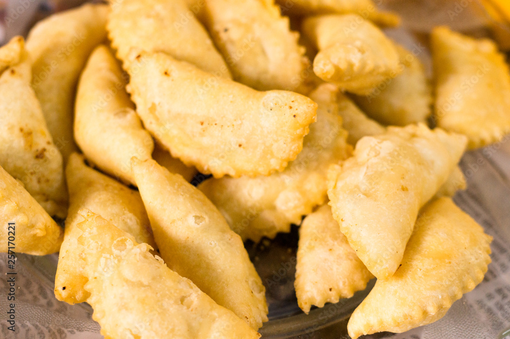 Closeup shot of gujiya , sweet filled delicacy served on holi and diwali Closeup shot of gujiya , sweet filled delicacy served on holi and diwali