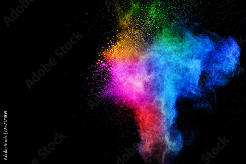 Colorful explosion for Happy Holi powder.Abstract background of color particles burst or splashing. © Pattadis