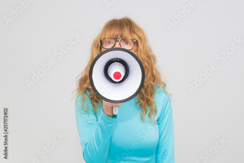 portrait of adult woman with megaphone