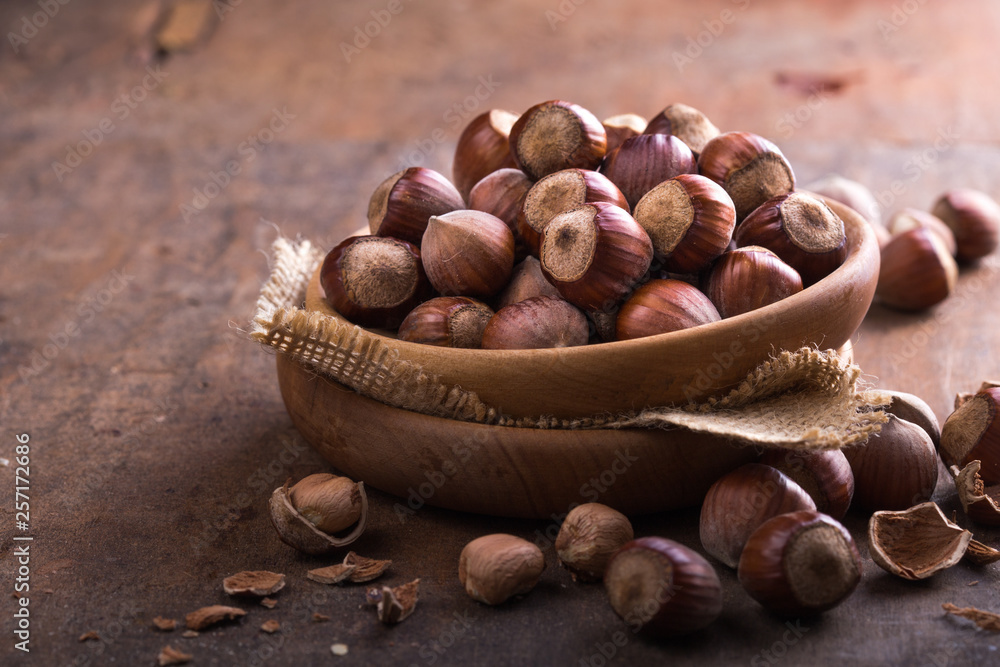 Hazelnuts and hazelnut shell on the wooden table. Hazelnuts and hazelnut shell on the wooden table.