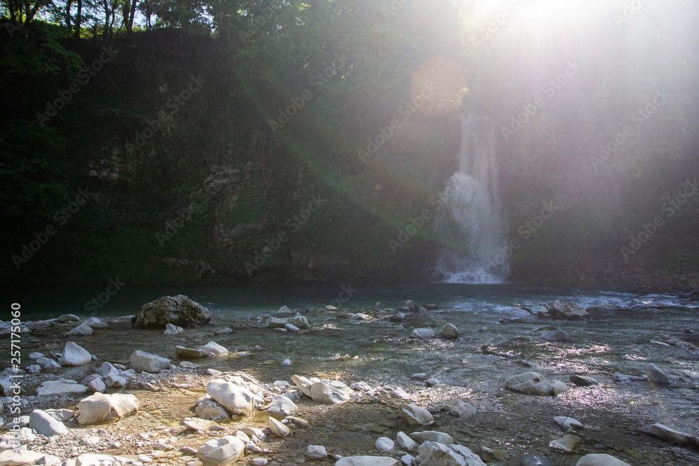 Obraz premium waterfall at sunset