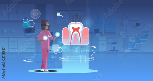 female doctor nurse wearing digital glasses looking virtual reality tooth human organ anatomy healthcare medical vr headset vision concept operation room interior full length horizontal