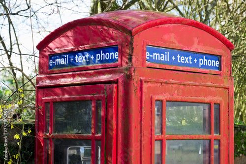 Red telephone booth box for email text and phone retro communication