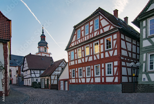 Fachwerkhäuser mit Kirchturm in der Altstadt von Erbach im Odenwald in Hessen, Deutschland  photo