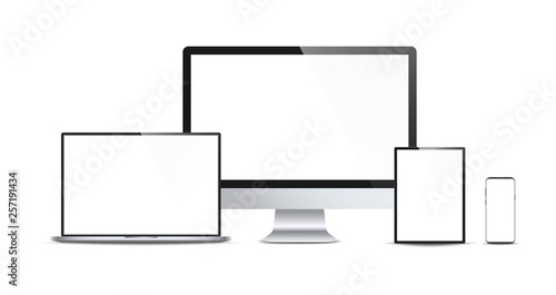 Set of realistic modern devices - desktop computer monitor, laptop, tablet, smartphone. Electronic gadgets isolated on white background. Mock up template for your design.