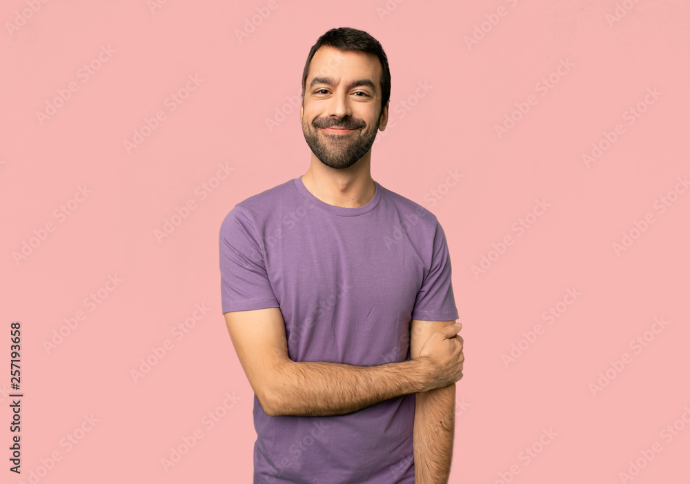 Handsome man With happy expression on isolated pink background Handsome man With happy expression on isolated pink background