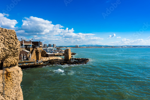 Medieval wall protecting Acre/Akko from the mediterranean sea in Israel photo