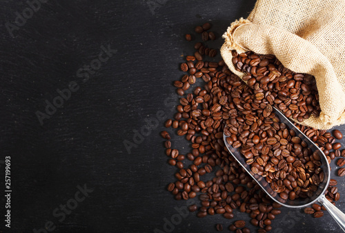 coffee beans in a sack, top view © Nitr