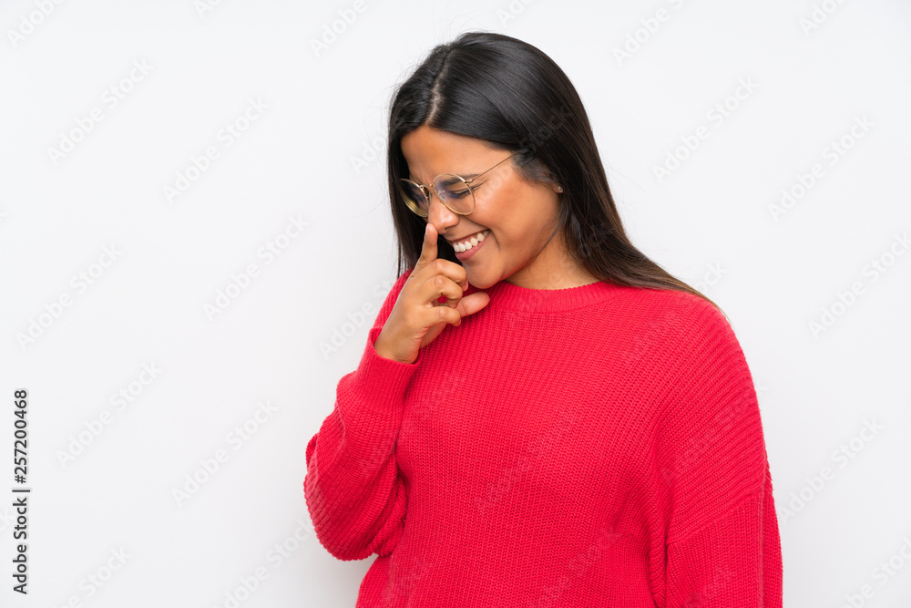 Young Colombian girl with glasses laughing Young Colombian girl with glasses laughing