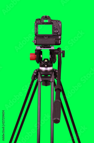 Dslr camera with green screen on the tripod isolated on green background.  The chromakey. Green screen. Stock Photo | Adobe Stock