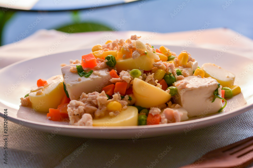 stir-fries egg tofu with minced chicken, pea, and carrot. Healthy food concept stir-fries egg tofu with minced chicken, pea, and carrot. Healthy food concept