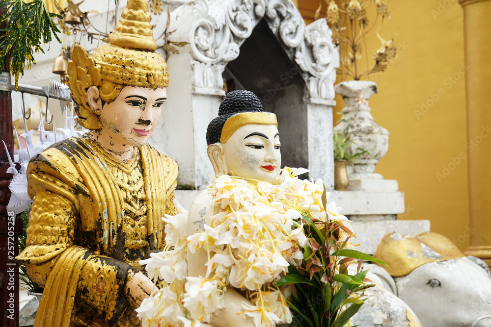 buddha image statue at Shwedagon Pagoda temple, Myanmar