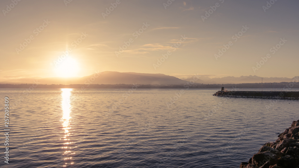 Sunrise at the shore of Lake Geneva.