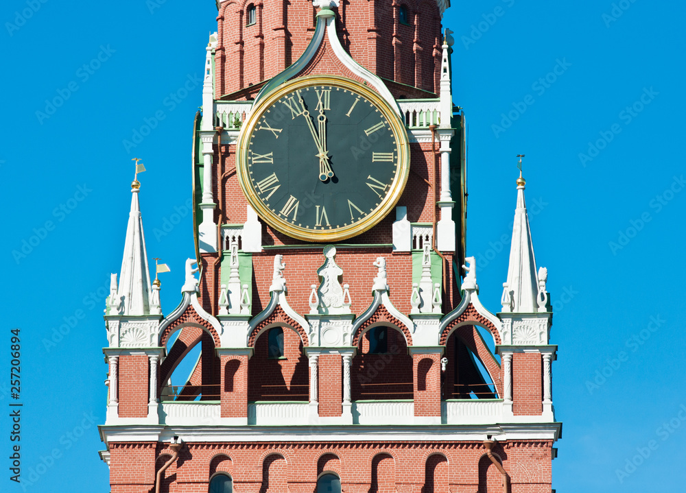 The Kremlin Clock (Kremlin Chimes) close up. Spasskaya Tower. Sunny day. Moscow. Russia