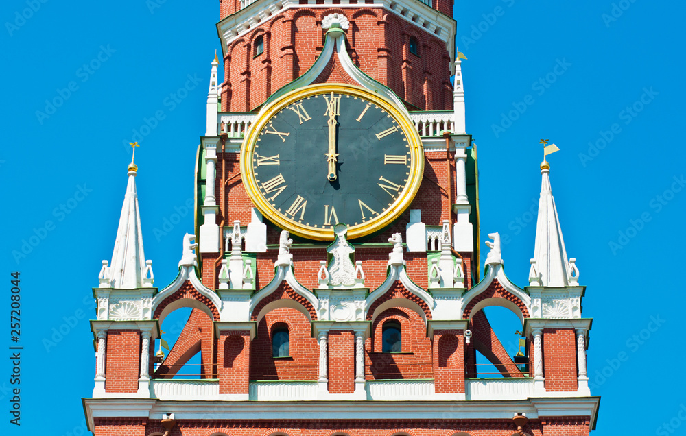 Kremlin chiming clock on the Spasskaya Tower. Noon. Moscow. Russia