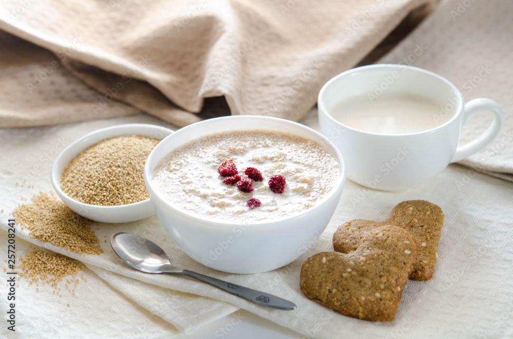 Healthy breakfast. Sesame dry cookies in the form of heart porridge of amaranth with strawberries and yogurt. Healthy breakfast. Sesame dry cookies in the form of heart porridge of amaranth with strawberries and yogurt.