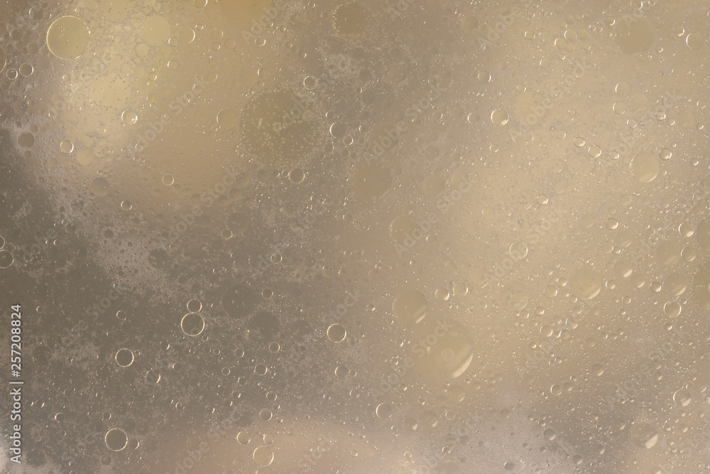 Beautiful texture of light broth that is cooked in a saucepan. Fat oily broth, bouillon, soup close-up Beautiful texture of light broth that is cooked in a saucepan. Fat oily broth, bouillon, soup close-up