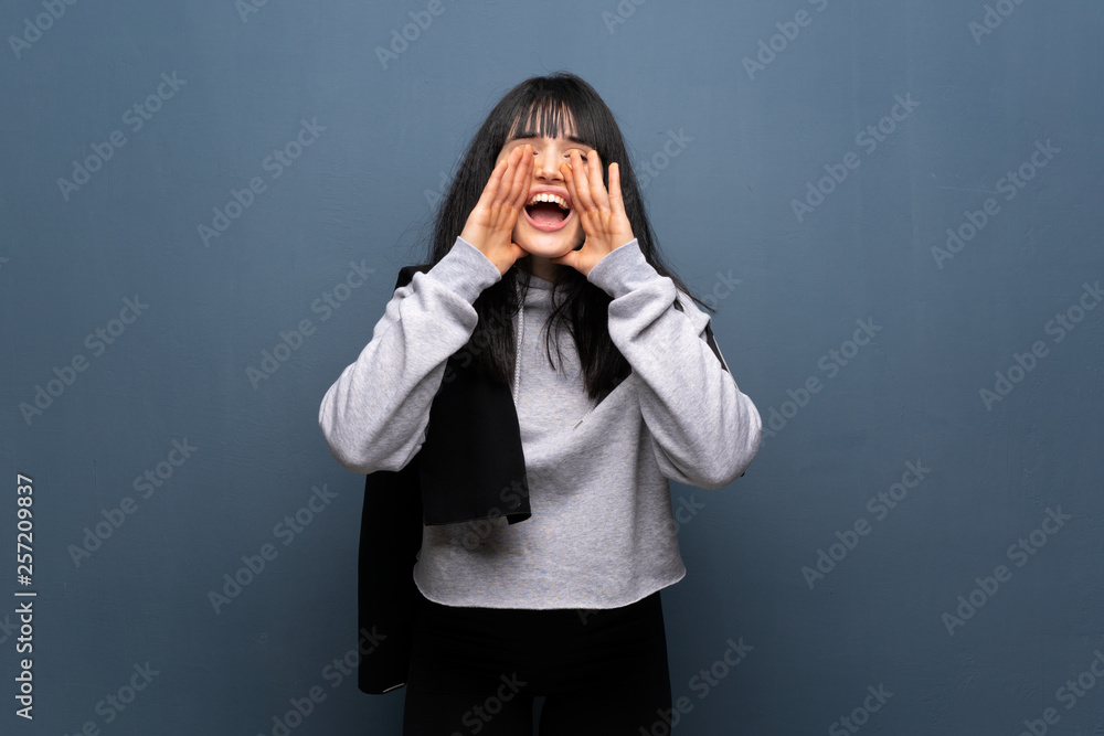 Young sport woman shouting and announcing something Young sport woman shouting and announcing something