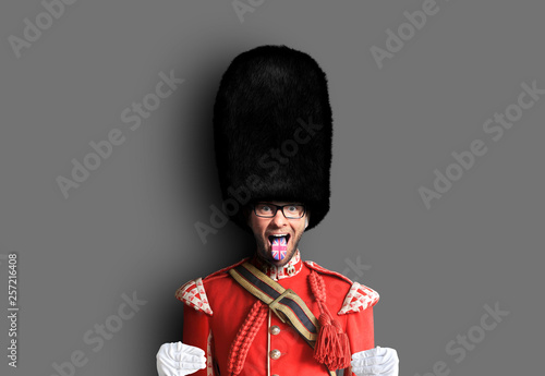 Young man in the costume of the Royal guards of Britain