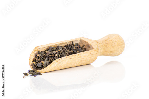 Konstfotografi Lot of pieces of dry black tea earl grey with wooden scoop isolated on white bac
