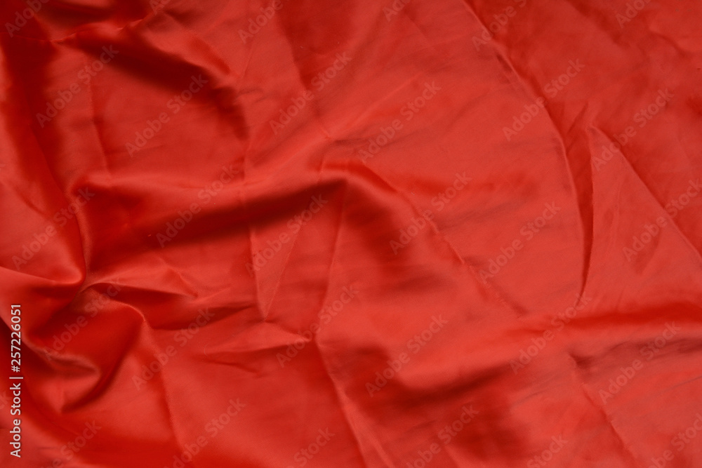 Photo - texture, fabric silk red, in abstract style. Beautiful background. Photo - texture, fabric silk red, in abstract style. Beautiful background.