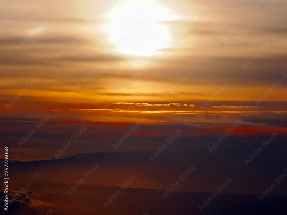 Fototapeta premium Sunset seen from an airplane