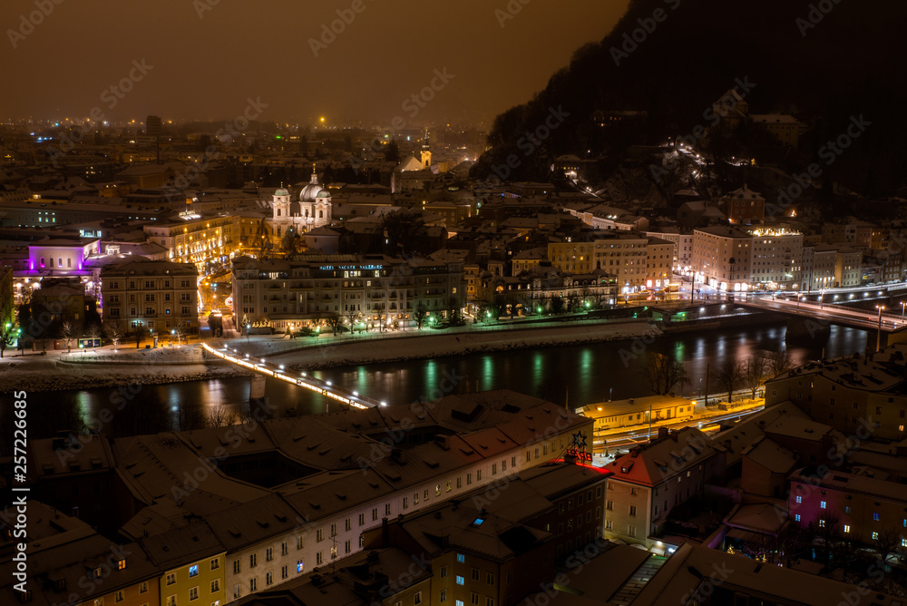 night view of the old town of Salzburg in winter