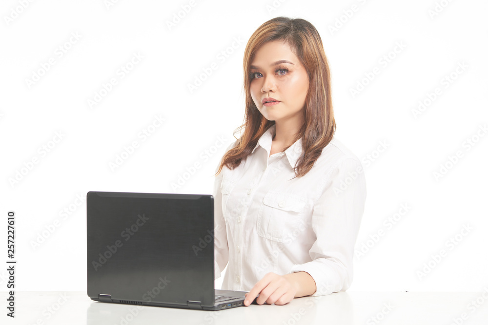 Office Lady In White Shirt using Laptop and File Office Lady In White Shirt using Laptop and File