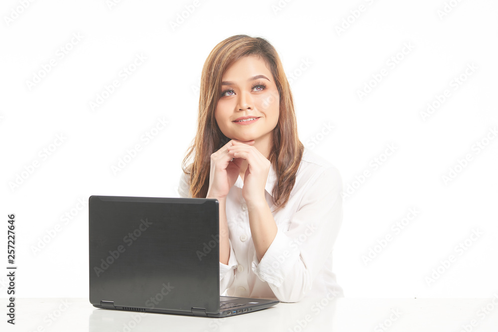 Office Lady In White Shirt using Laptop and File Office Lady In White Shirt using Laptop and File