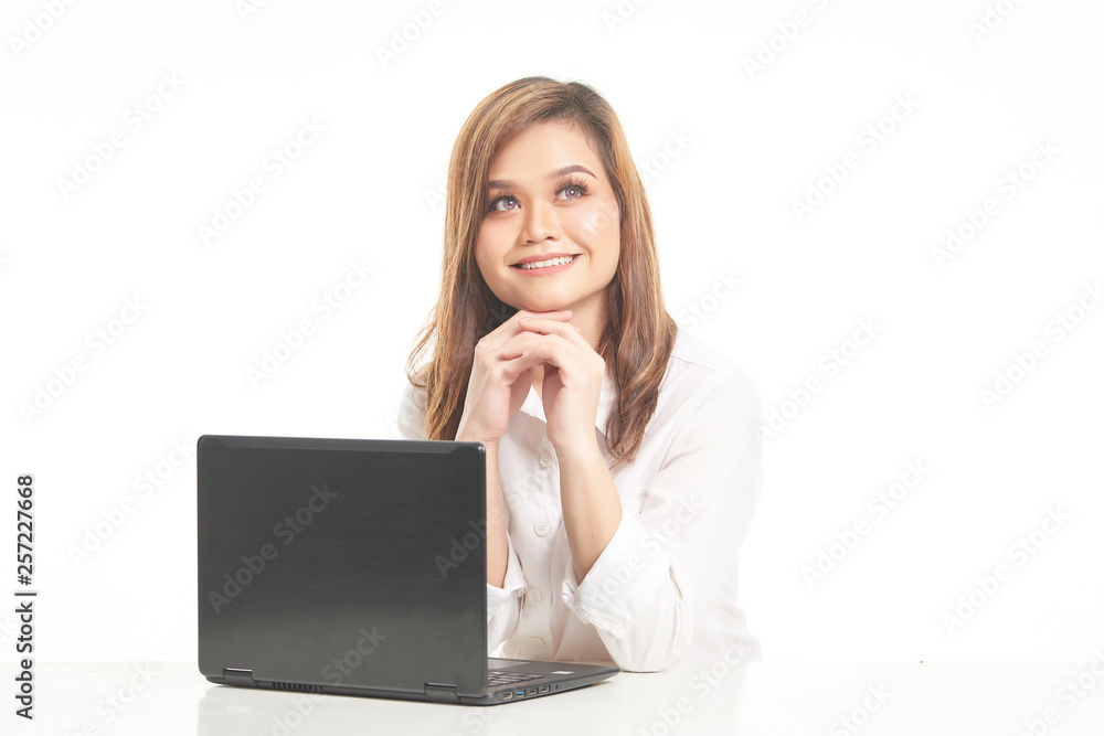 Office Lady In White Shirt using Laptop and File Office Lady In White Shirt using Laptop and File