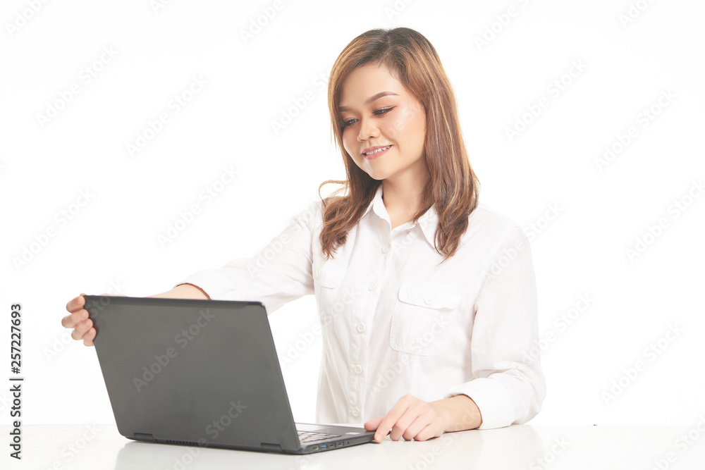 Office Lady In White Shirt using Laptop and File Office Lady In White Shirt using Laptop and File