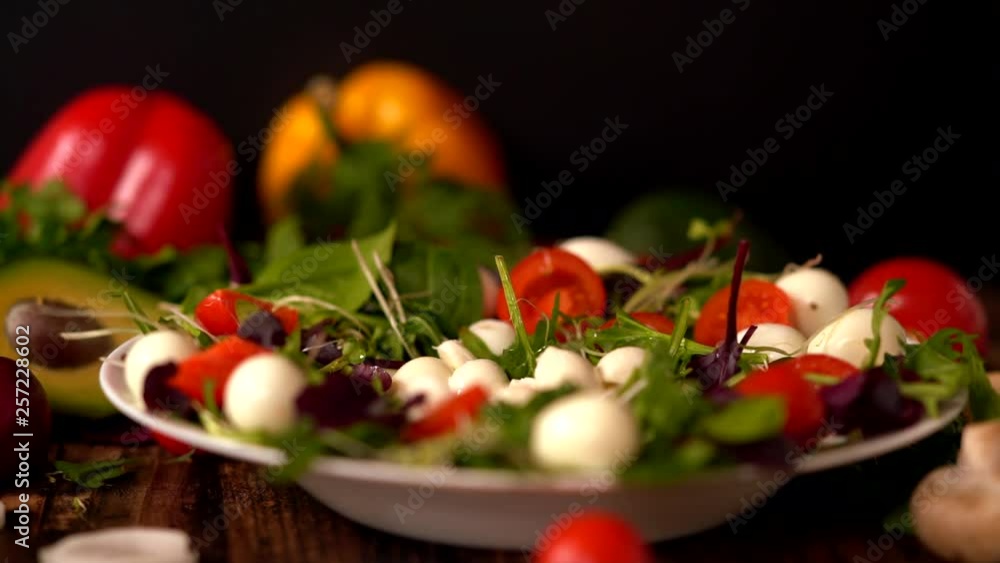 Chef making a fresh mixed salad Chef making a fresh mixed salad