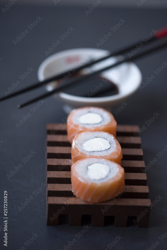 Sushi and tea are on the table, Japanese food. Sushi and tea are on the table, Japanese food.