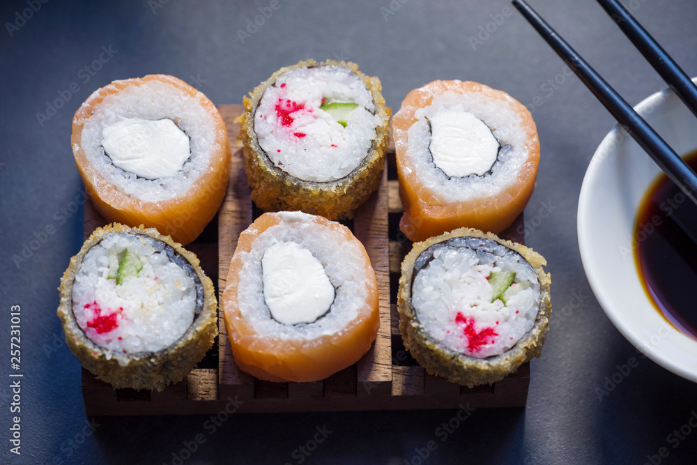 Sushi and tea are on the table, Japanese food. Sushi and tea are on the table, Japanese food.