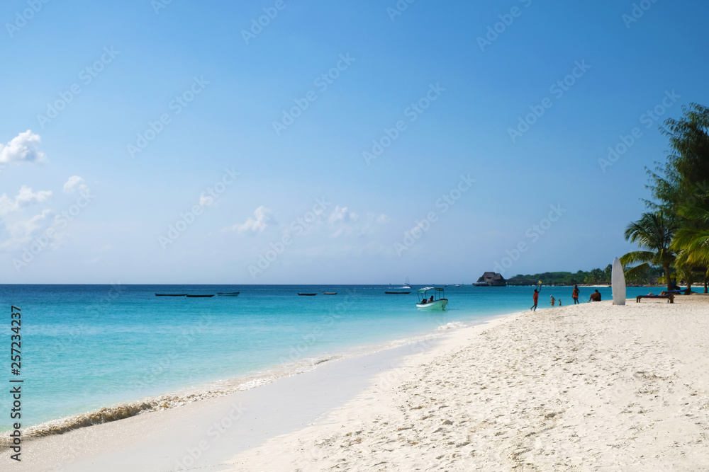 Amazing paradise ocean beach view People chilling on Zanzibar island