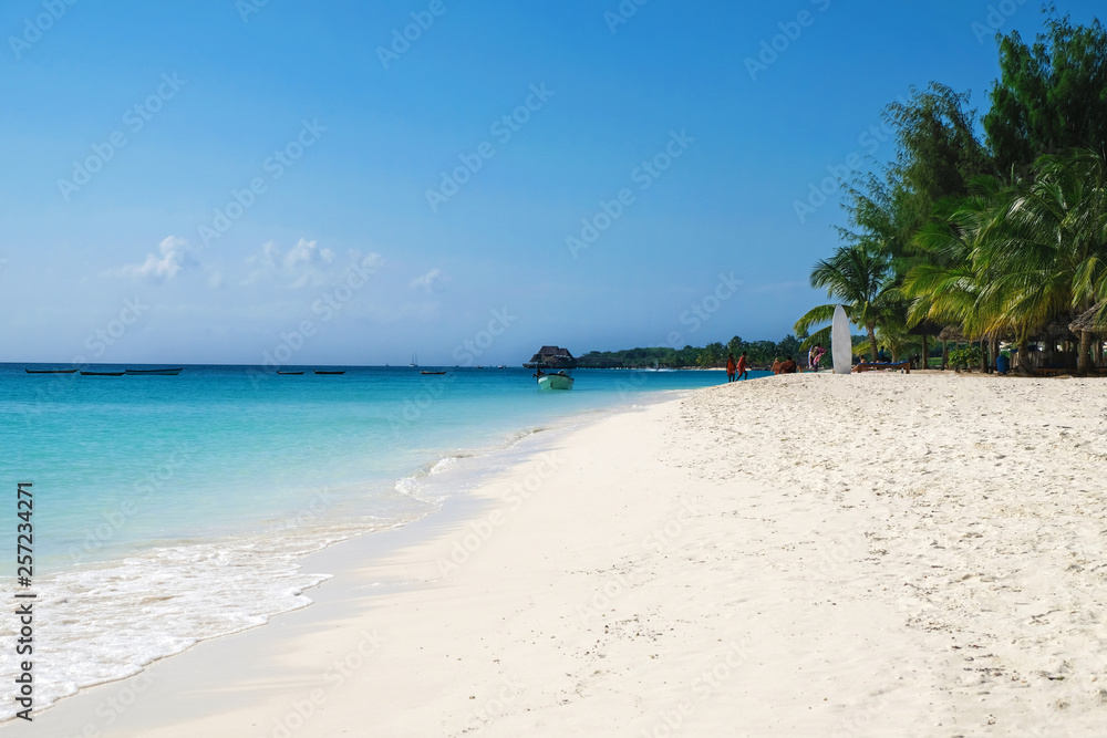 Amazing paradise ocean beach view People chilling on Zanzibar island