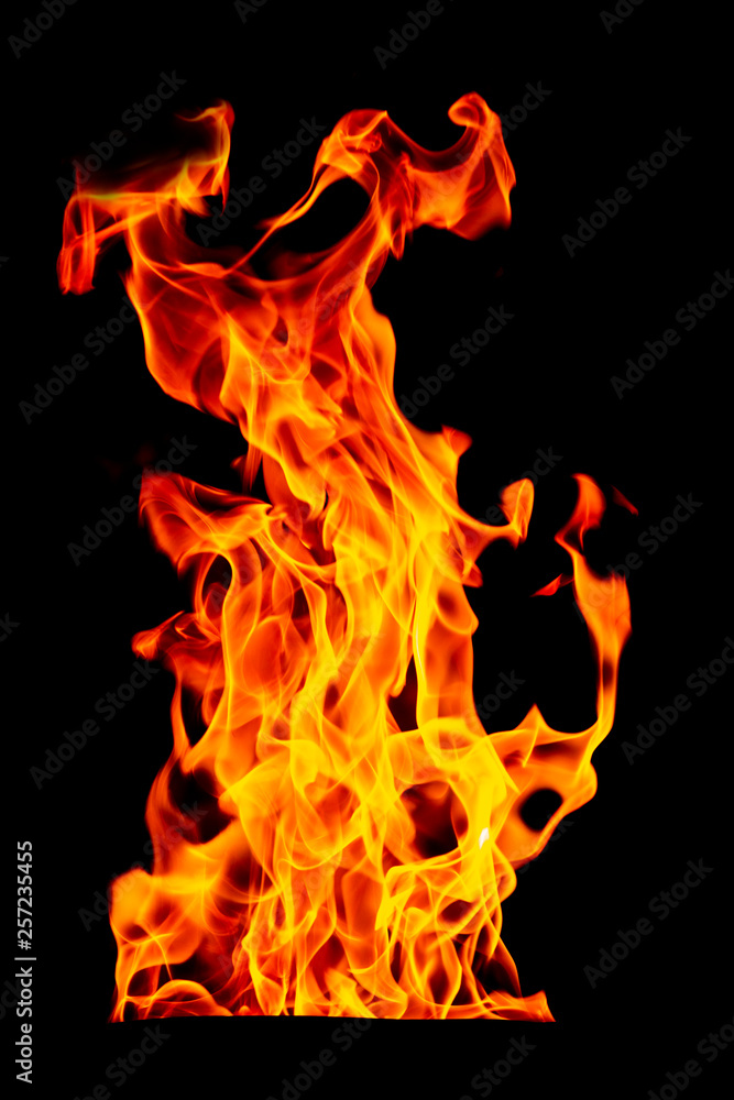 Fire flame isolated on black isolated background - Beautiful yellow, orange and red and red blaze fire flame texture style. Fire flame isolated on black isolated background - Beautiful yellow, orange and red and red blaze fire flame texture style.