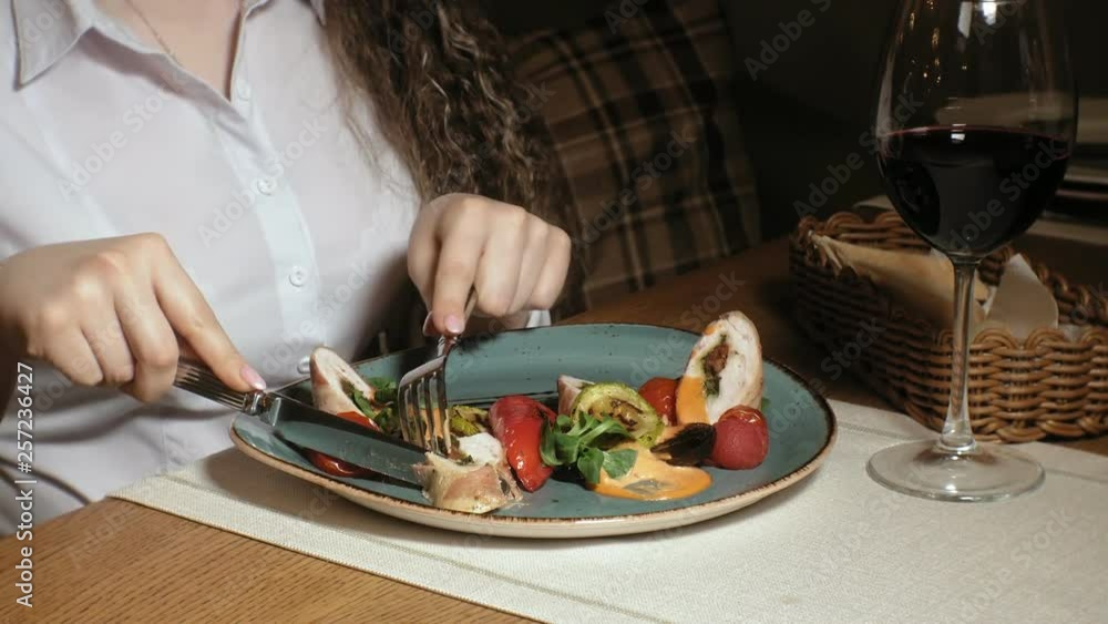 Beautiful blonde woman eating and drinking in restaurant, lunch or dinner time Beautiful blonde woman eating and drinking in restaurant, lunch or dinner time