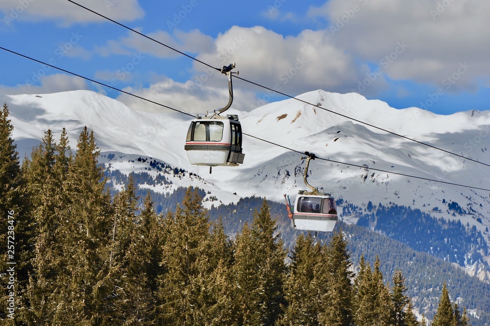 Gondola with winter background in ski resort 