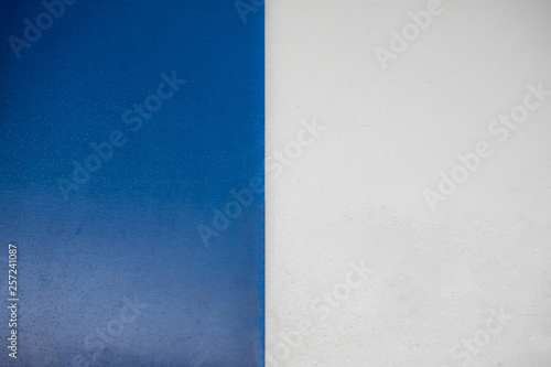 Half a blue and white acrylic sign background