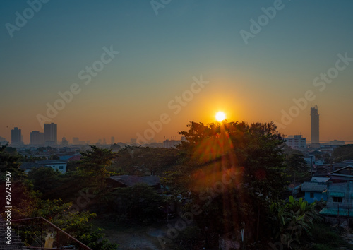 The beautiful sunrise panorama view of a small town with clear sky from the window