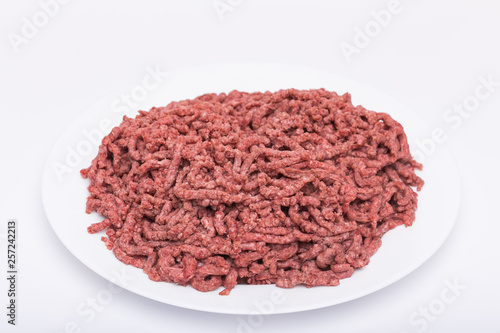 Top view of raw minced beef meat isolated on white