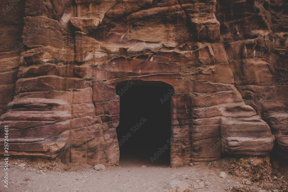 Foto Stock ancient cave entrance carved in stone building landmark  arhceological object | Adobe Stock